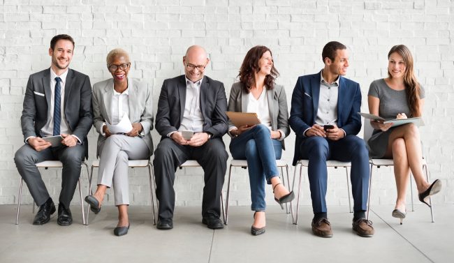 Group of diverse people are waiting for a job interview Consumer Brand Agency Partnerships: A Win-Win for Talent Acquisition