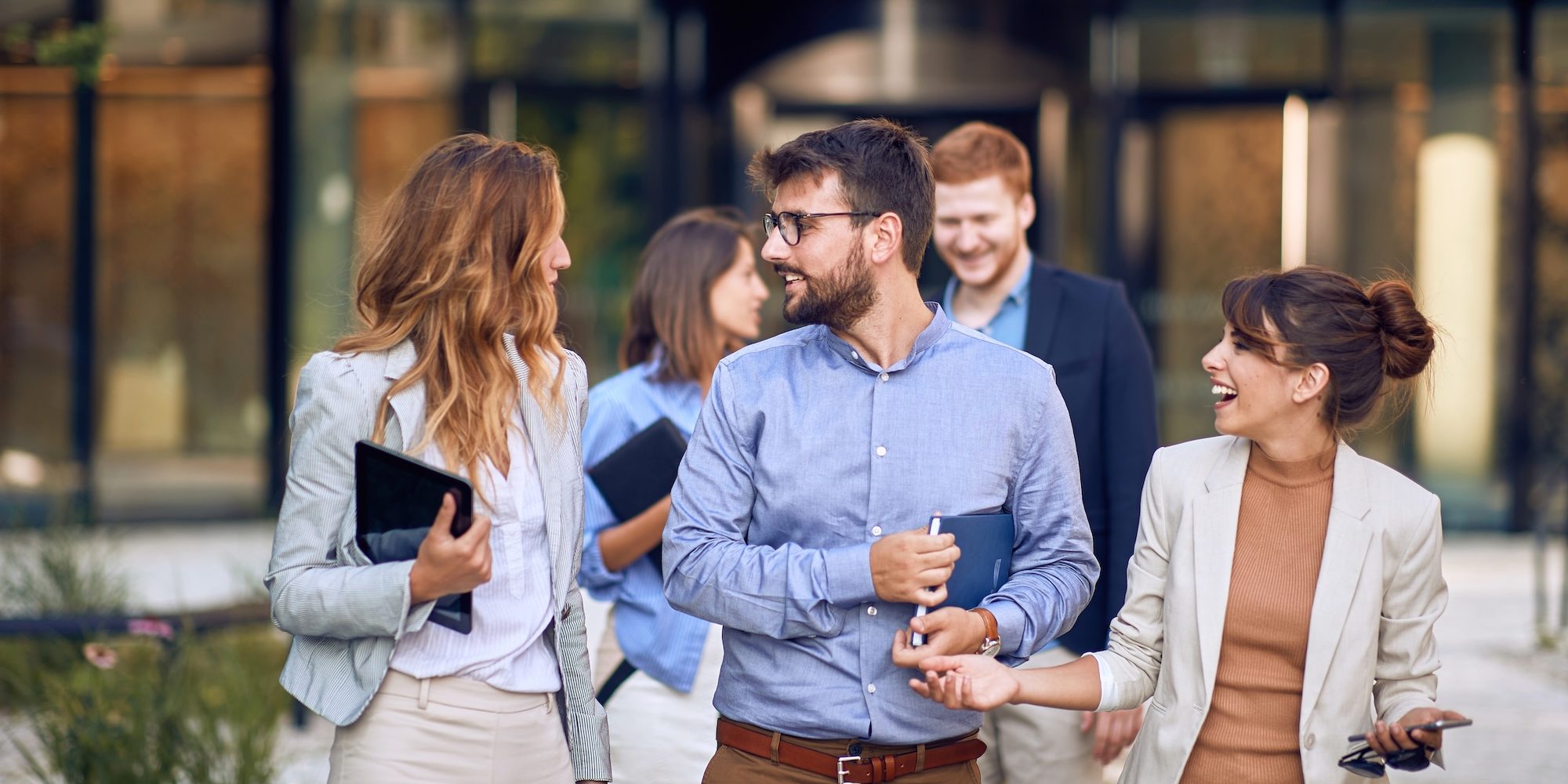 Young, urban group of bussinespeople walking Driving Growth: Key Qualities to Seek in a CPG CEO Hire