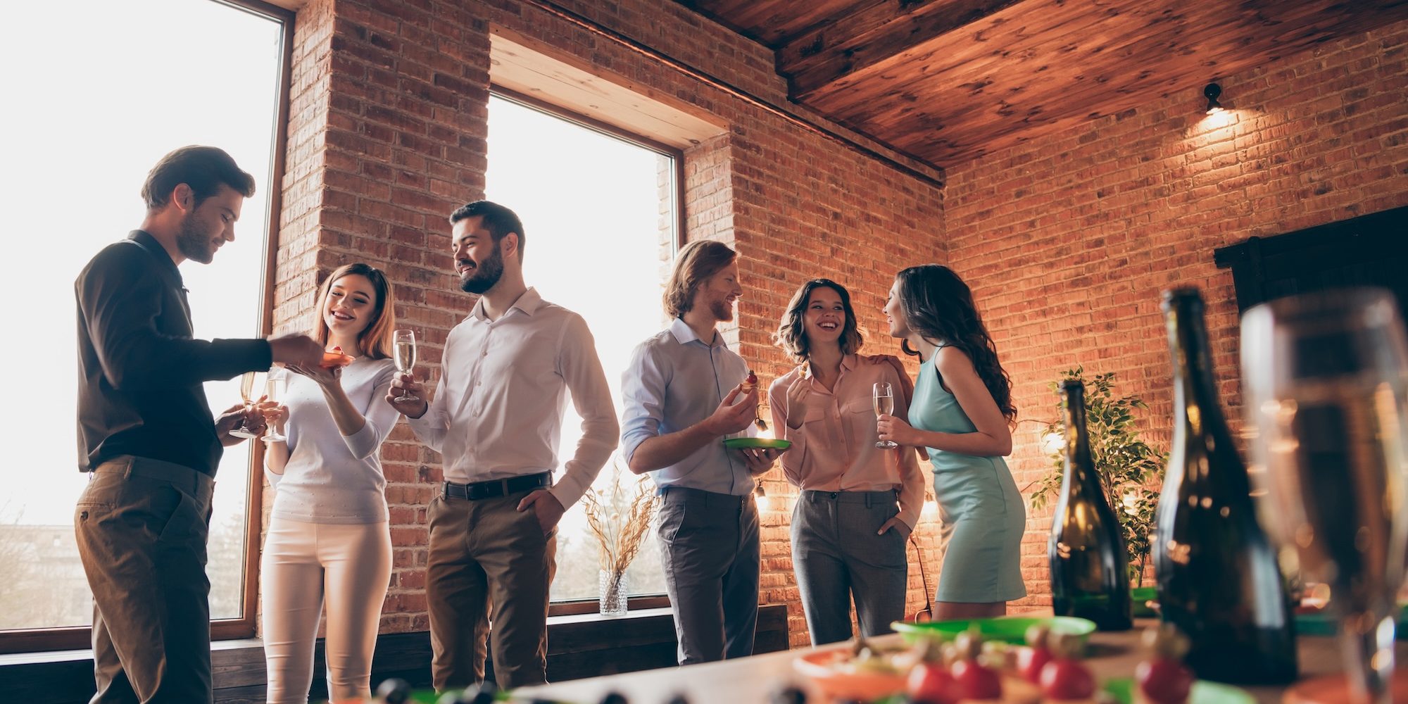 Company of six nice trendy attractive pretty elegant cheerful glad positive caucasian guys ladies pairs pal having fun luncheon brunch best tradition table buffet snack industrial loft interior room How to Build a High-Performing Consumer Goods Sales Team